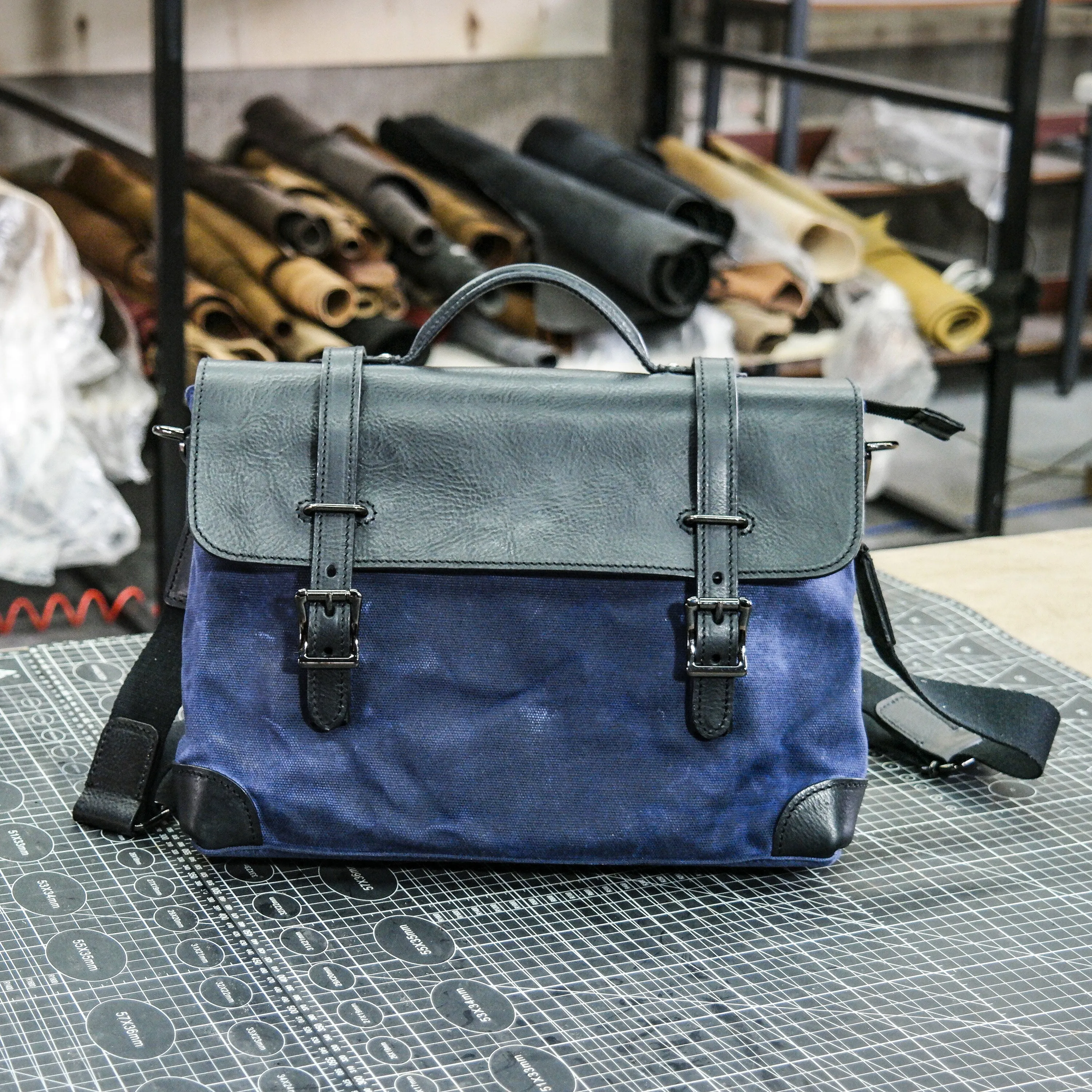 Black vegetable tanned blue waxed canvas men's and women's crossbody bag
