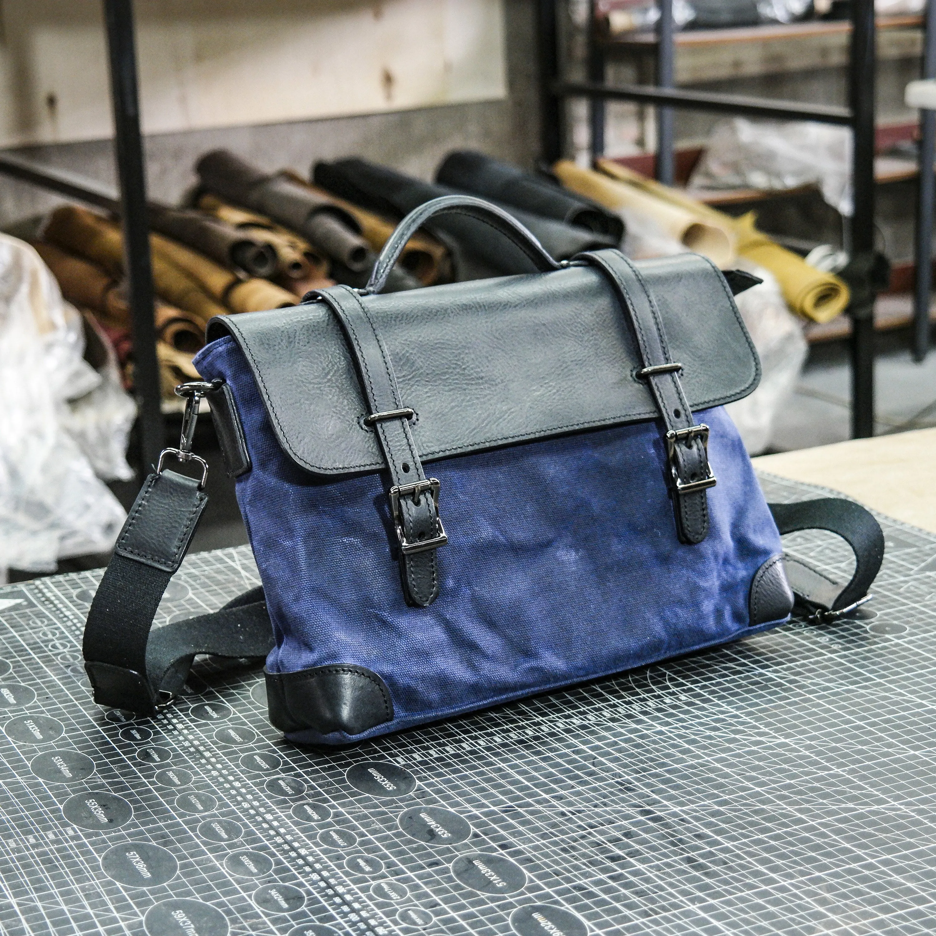 Black vegetable tanned blue waxed canvas men's and women's crossbody bag