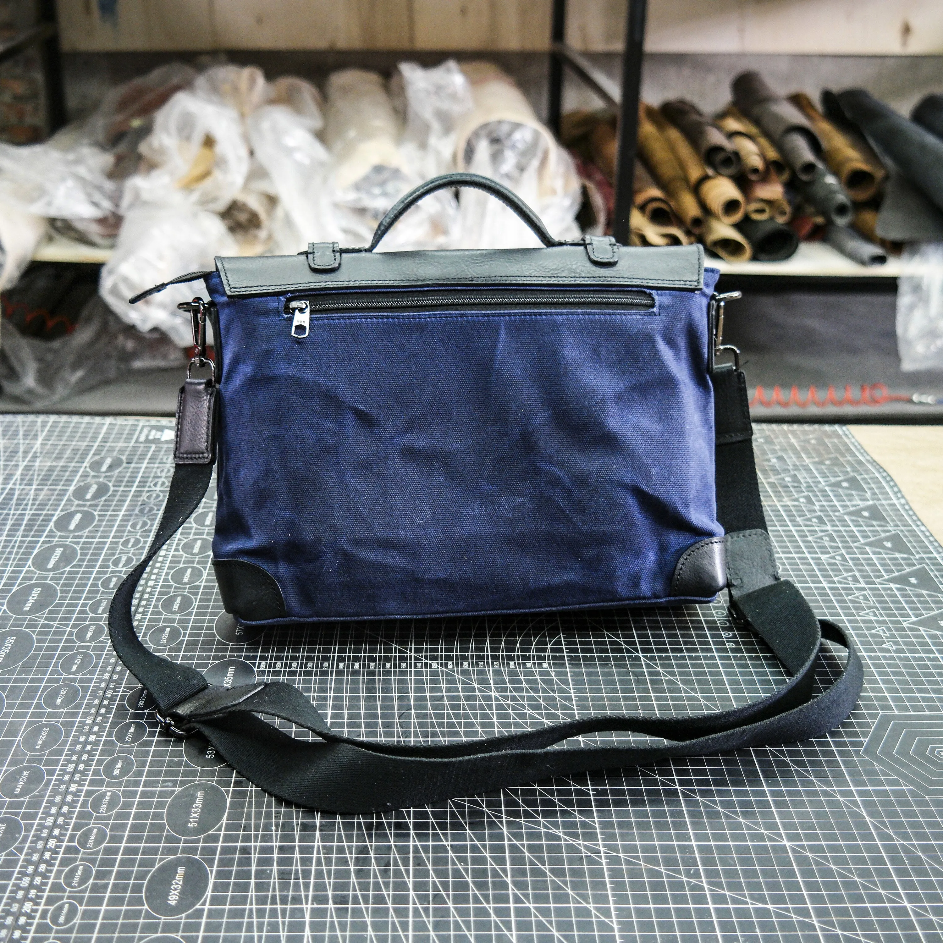 Black vegetable tanned blue waxed canvas men's and women's crossbody bag
