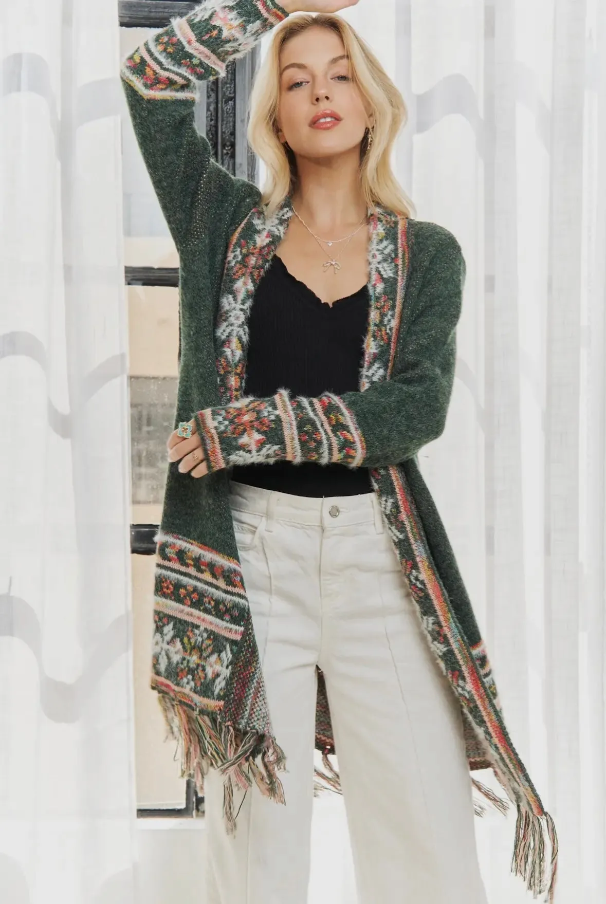 Green cardigan with fringe hem