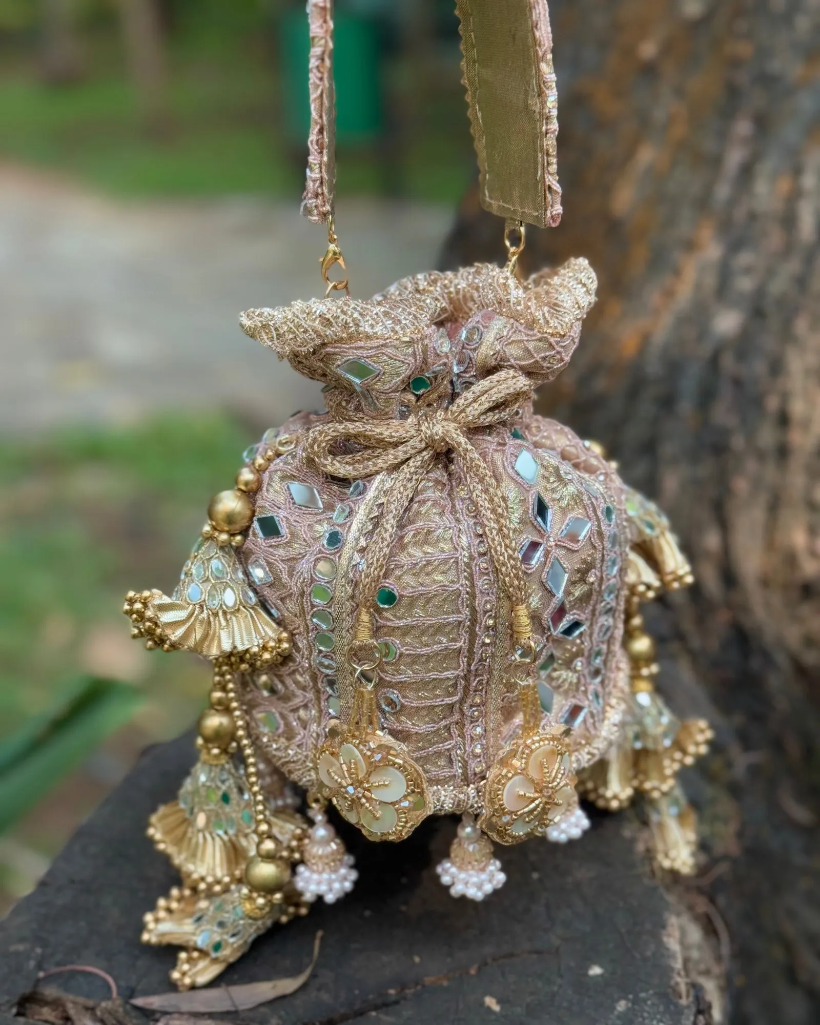 MIRROR POTLI WITH TASSELS PASTEL PINK