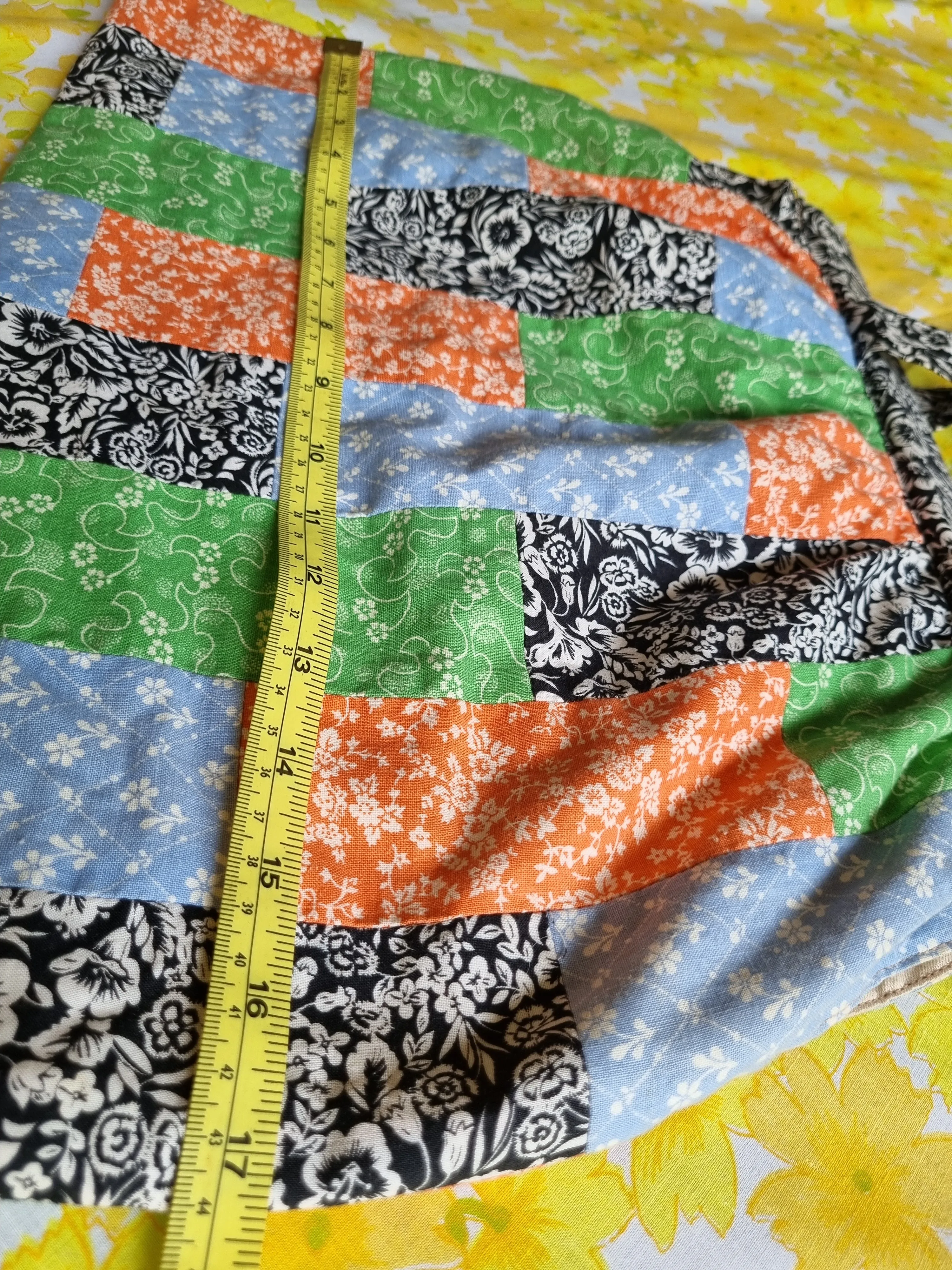 Patchwork Bag With White Floral Patterns