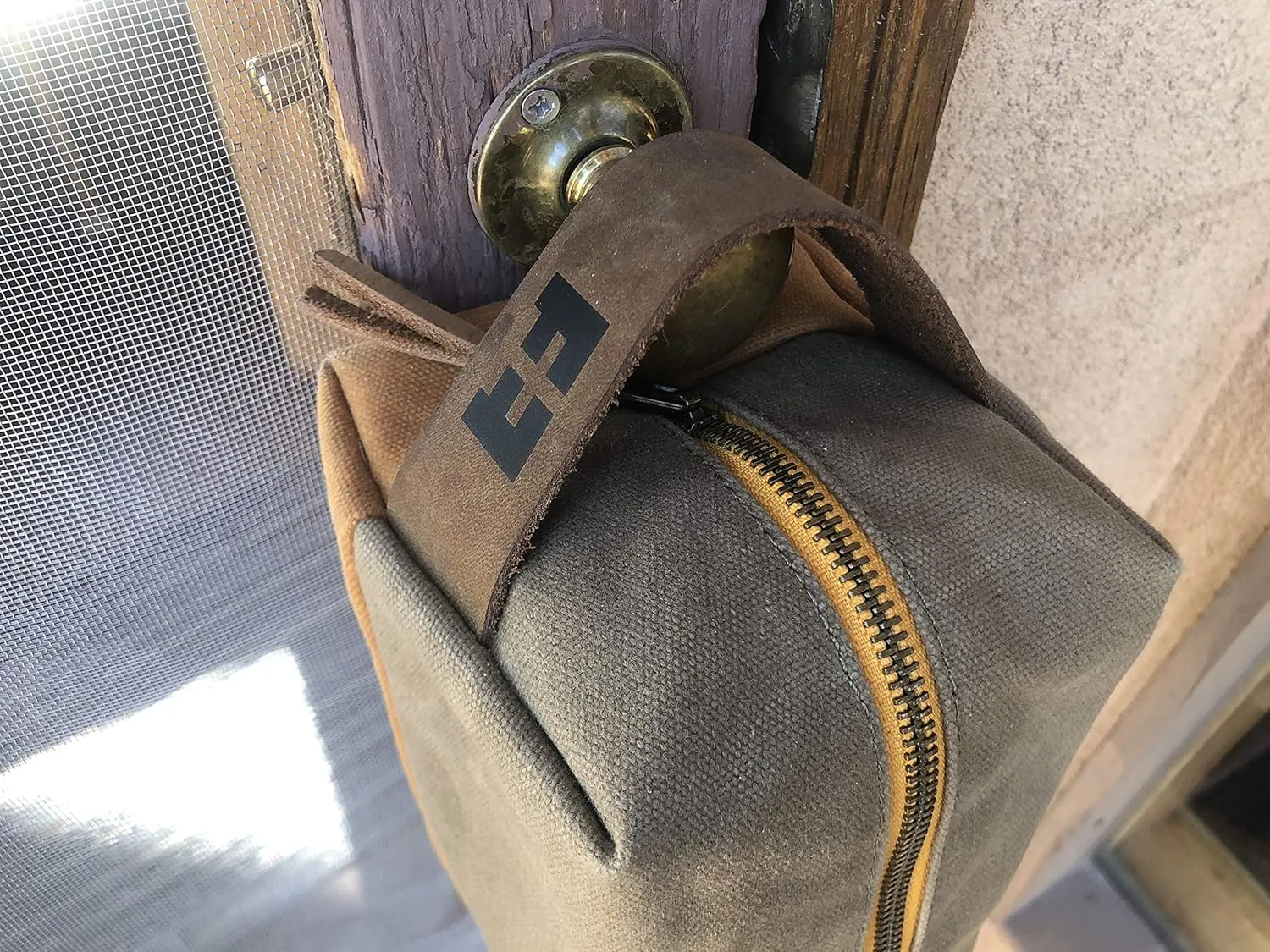 the DOPP KIT | durable waxed cotton canvas toiletry bag with leather handle (SandDune)